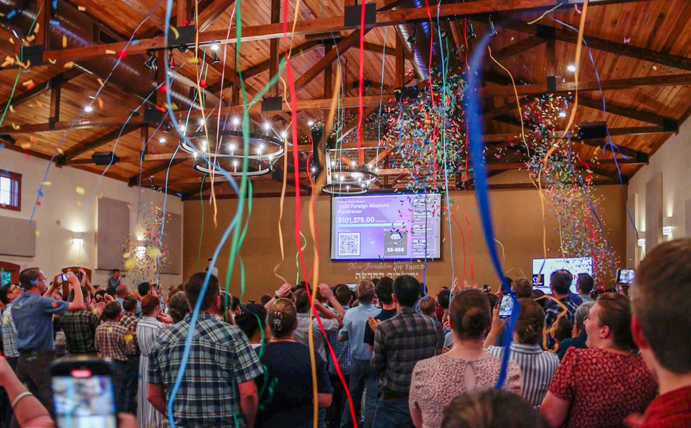 Confetti falls over the Heritage Youth Missions foreign-missions fundraiser
